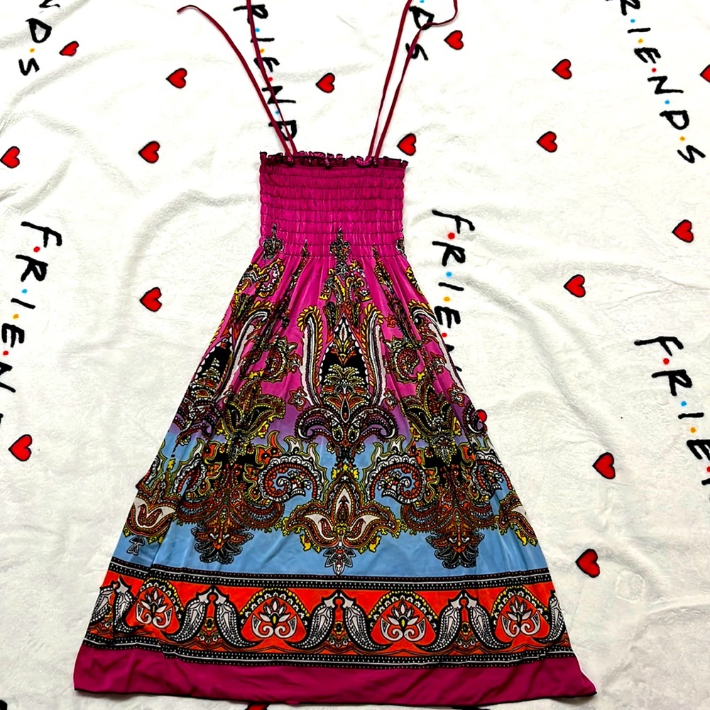 Unknown brand, stretchy women’s dress in size small.